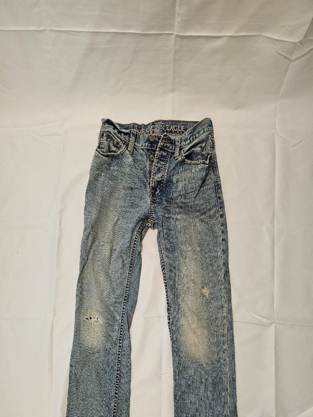 Rare distressed AE button fly jeans